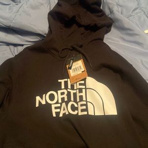 Black North Face hoodie, never worn, size large